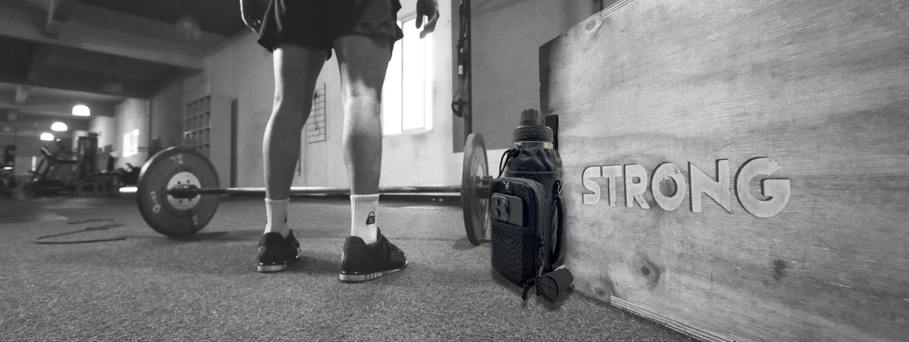 Bolso magnético para gimnasio en máquina de pesas